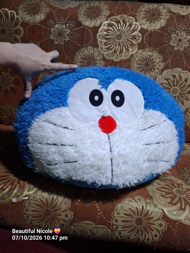 Sega BIG Doraemon Plush Cushion (Category: Plushies & Soft Toys) located in Quezon City. Submitted by NGClove (Listing ID 1466500455, Image 3). Description: - Selling one of my plushie collections -Official SEGA x Fujiko-Pro merchandise with tag attached - Adorable Doraemon face design with a soft fuzzy front and plush blue back - Perfect as a snug pillow or fun room decor for fans - Condition: Brand new with tag.