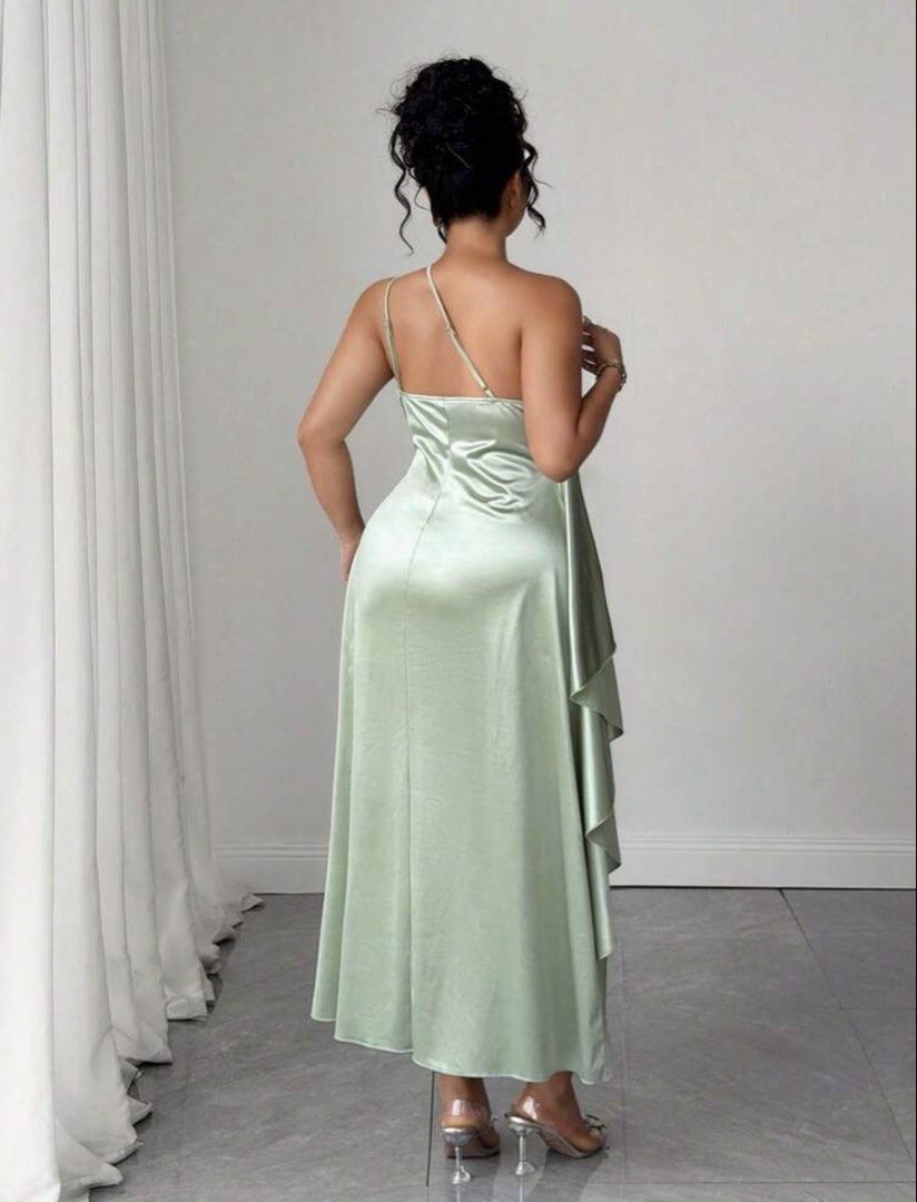 SHEIN Asymmetrical Plus Size Dress (Category: Dresses) located in Makati City. Submitted by dpfran (Listing ID 1466383158, Image 2). Description: - Color: Sage green - Fabric: Smooth, shiny satin - Length: Midi - Neckline: One-shoulder with thin strap detailing across the back - Fit: Fitted bodice with flattering ruching gathered down the right hip - Details: High side slit on the right leg and an asymmetrical draped ruffle cascading down the bac
