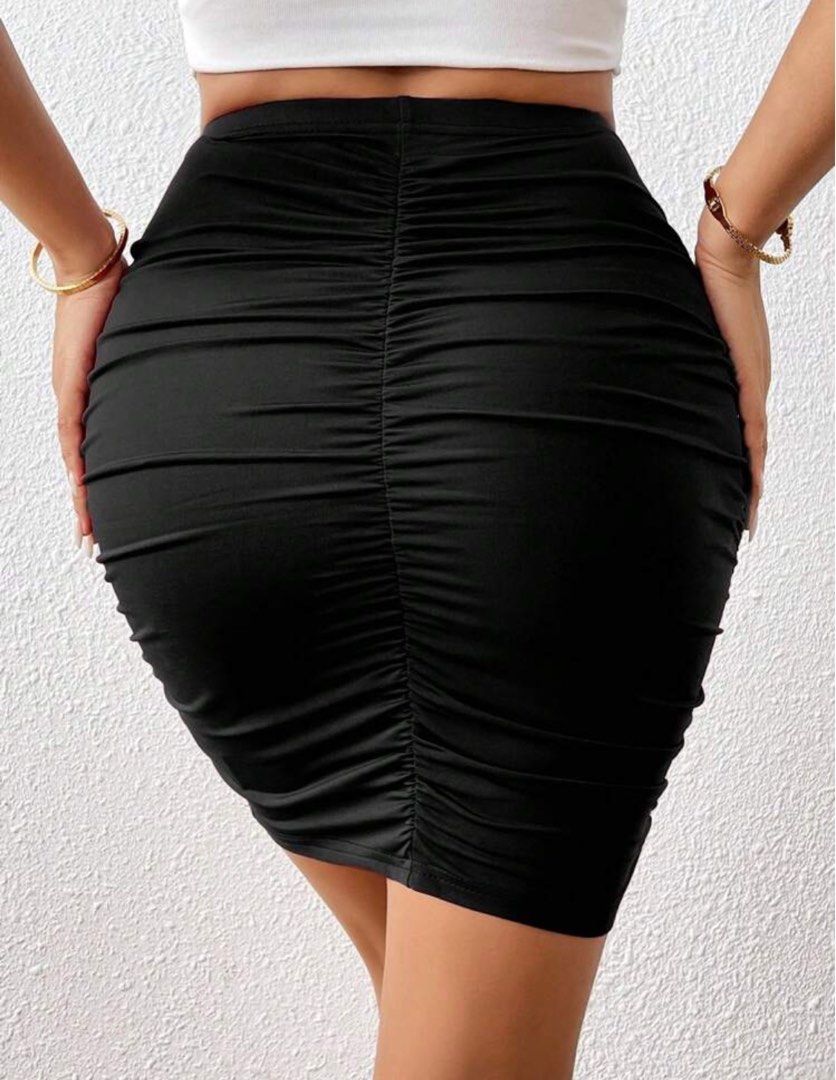 Shein Black Ruched Bodycon Mini Skirt (Category: Skirts) located in Manila. Submitted by goddesssy (Listing ID 1466407079, Image 2). Description: - Color: Black - Style: Bodycon mini skirt with heavy all-over ruching - Fit: High-waisted, super stretchy, and form-fitting - Length: Short - Versatility: Easy to style for casual daytime looks or night outs.