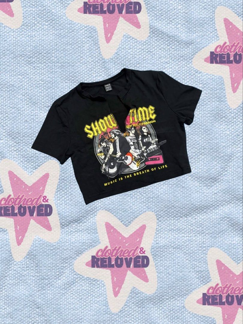 SHEIN Graphic Crop Top (Category: Shirts) located in Binan City. Submitted by szummie (Listing ID 1466466849, Image 1). Description: - Brand: SHEIN - Color: Black - Design: Split neckline with chest graphic print - Style: Crop top with short sleeves.