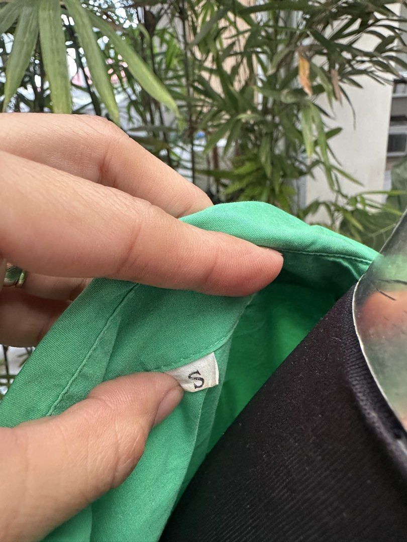 Shein Green Button Down Shirt (Category: Shirts) located in Bulacan. Submitted by thriftbagcollections (Listing ID 1466357128, Image 3). Description: - Brand: Shein - Size: Small - Color: Bright Green - Features: Pointed collar, front button closure, single chest pocket, long sleeves with button cuffs - Condition: Excellent / Pre-loved - Style: Great for layering, casual days, or office wear.