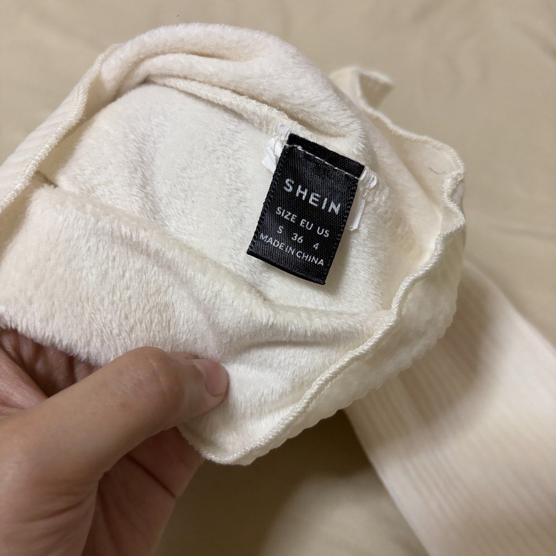 SHEIN Off Shoulder Ribbed Long Sleeve Top (Category: Longsleeves) located in Mandaluyong City. Submitted by afterceej (Listing ID 1466473134, Image 2). Description: - Brand: SHEIN - Style: Off-shoulder long sleeve top, slim fit - Color: Cream white - Size: Small (EU 36, US 4) - Material: Soft ribbed velvet-like fabric - Condition: Great basic piece for layering or wearing on its own 📍 Mandaluyong 🚚 Shipping fee c/o buyer via Lalamove or J&T DM 