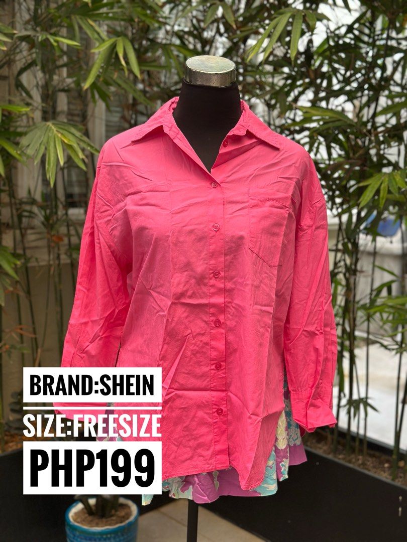 SHEIN Pink Button-Up Shirt (Category: Blouses) located in Bulacan. Submitted by thriftbagcollections (Listing ID 1466357213, Image 1). Description: Bright pink button-up shirt from SHEIN. Features a classic collar, front button closure, and a single chest pocket on the left side. Long sleeves with button cuffs. Relaxed fit style. Tagged size S. Easy to pair with skirts, jeans, or shorts for casual everyday outfits..