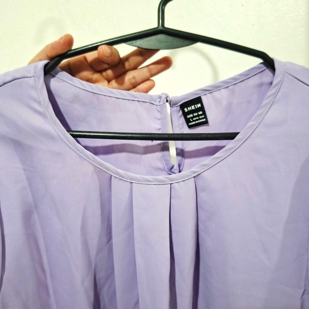 SHEIN Purple Blouse/Top Size Large (Category: Blouses) located in Cagayan de Oro. Submitted by langscloset (Listing ID 1466454570, Image 3). Description: original SHEIN top. size large. like new, no issue at all. once lang tlga to nagamit for an event I attended in the past na purple ang motif. fabric is very smooth sa balat and malamig suotin. lp na. pls no offer. .