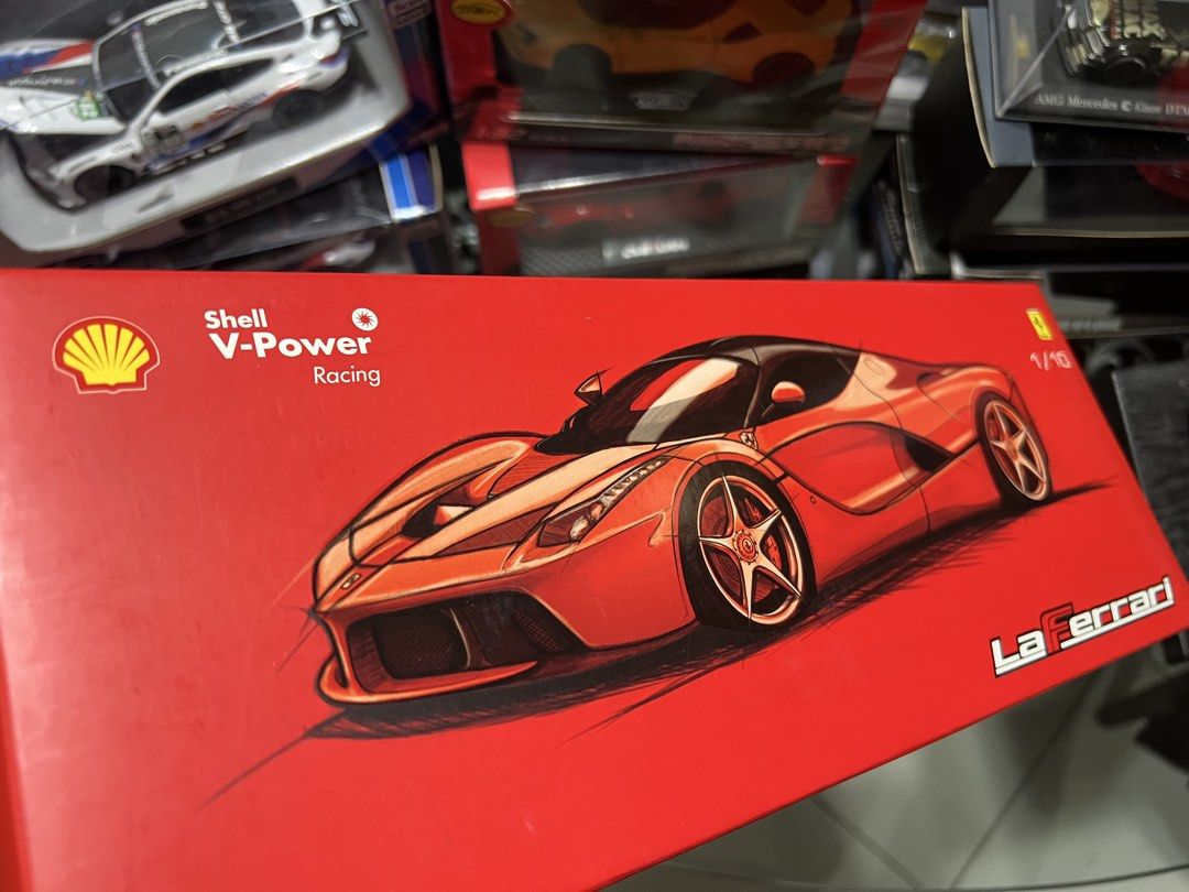 Shell V-Power Racing LaFerrari 1/18 Scale Model (Category: Vehicle & Diecast Models) located in Manila. Submitted by cterrineni76861 (Listing ID 1466491881, Image 1). Description: - Scale: 1/18 diecast replica - Series: Ferrari Signature Series (Shell V-Power Racing edition) - Packaging: Red box with detailed artwork on front and top covers - Recommended Age: 3 years old and up - Condition: Brand new, perfect for display and collectors.