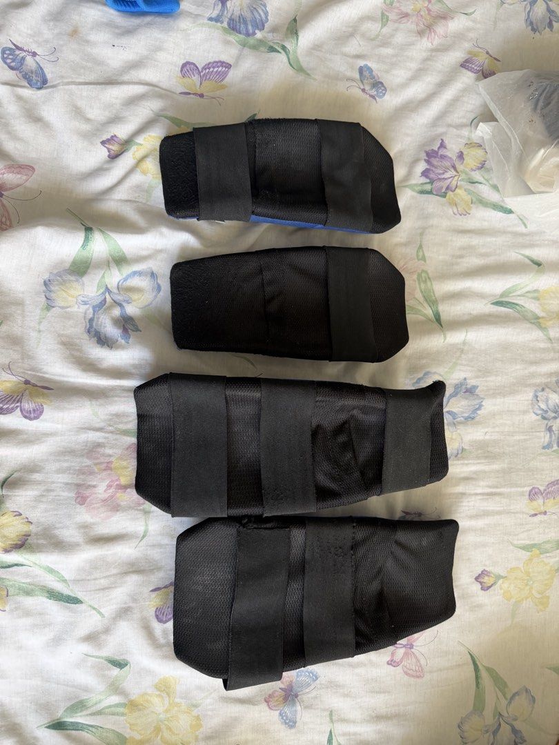 Shift Blue Size M Protective Guards (Category: Combat Sports) located in Manila. Submitted by fitandshop (Listing ID 1466515748, Image 3). Description: - Brand: Shift - Quantity: Set of four guards - Size: Medium - Material/Design: Blue honeycomb textured fabric with black mesh backing - Closure: Secure black Velcro straps - Branding: Clear white logo patch on the front - Condition/Use: Ideal for sports and training Flaws: need to change strap .