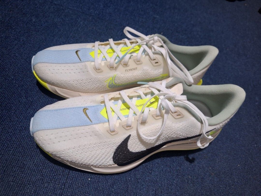 Size 10.5 nego (Category: Casual Shoes) located in Manila. Submitted by adolphreyes645 (Listing ID 1466427995, Image 1). Description: - Brand: Nike Flyknit - Color: White with blue stripe, black swoosh, and neon yellow accents - Features: Lightweight design, great support, comfortable fit - Ideal for: Daily runs, gym workouts, and casual wear - Condition: Ready for a new owner.