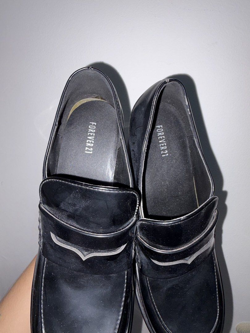 Size 8 - Forever 21 Black Chunky Platform Loafers (Category: Loafers) located in General Trias. Submitted by hayami.clo (Listing ID 1466369992, Image 3). Description: - Brand: Forever 21 SIZE 8 - Style: Black chunky platform loafers with high block heel and thick layered sole - Design: Slip-on with a classic penny loafer strap - Finish: Glossy - Condition: NEW - Perfect for elevating your casual or edgy everyday outfits!.