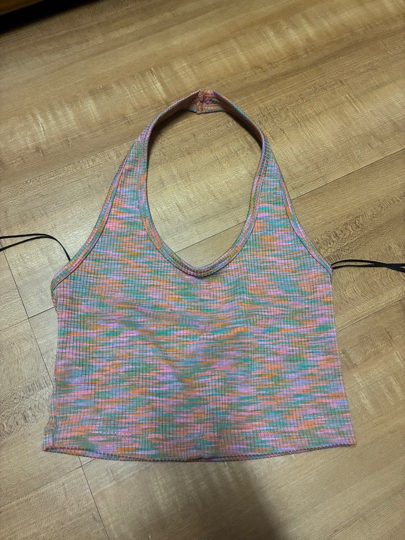 Sleeveless Multicolor Ribbed Knit Halter Crop Top (Category: Sleeveless) located in Quezon City. Submitted by habits.mnl (Listing ID 1466453801, Image 1). Description: Midnight sun concert outfit inspo 🩷 Tags removed, never worn - Multi-colored ribbed knit fabric (pink, green, orange, and blue) - Trendy halter neck with an open back design - Adjustable thin black side ties - Flattering cropped length near the waist - Super stretchy and snug fit.