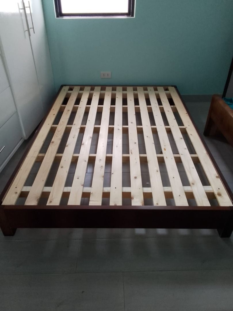 Solid Rubberwood Bed Frame (Category: Bed Frames & Mattresses) located in Caloocan City. Submitted by lyyyzzzz (Listing ID 1466502714, Image 2). Description: • Solid rubberwood construction • Treated & termite-free • Wood, Walnut & White finish • Regular / Pull-up Storage / Drawer Storage • Small to King sizes available • Free installation • Sturdy slatted mattress support • Low-profile or standard height options.