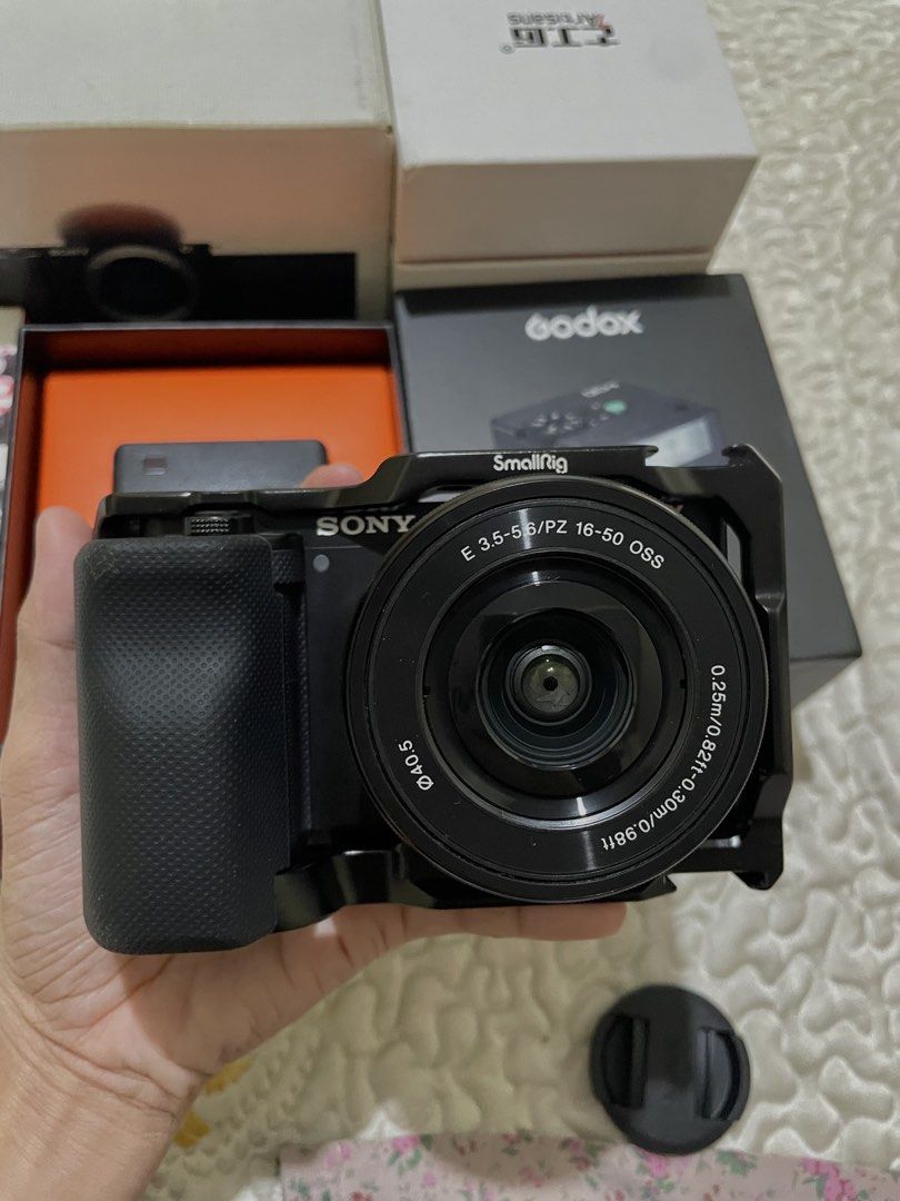 SONY ZV-E10 - COMPLETE VLOGGING SET (Category: Cameras) located in Davao. Submitted by cordeliaamara (Listing ID 1466357511, Image 3). Description: 📸 SONY ZV-E10 bought for ₱42,000 Inclusions: * Sony ZV-E10 Camera Body * Sony 16–50mm Pancake Kit Lens * 7Artisans 55mm F1.4 Lens — ₱5,990 * Godox IM30 Flash — ₱1,800 * SmallRig Camera Cage — ₱2,000 * Ulanzi MT-08 Tripod — ₱599 * 2 Batteries * 32GB SanDisk SD Card * Screen Protector * Camera Bag Cond