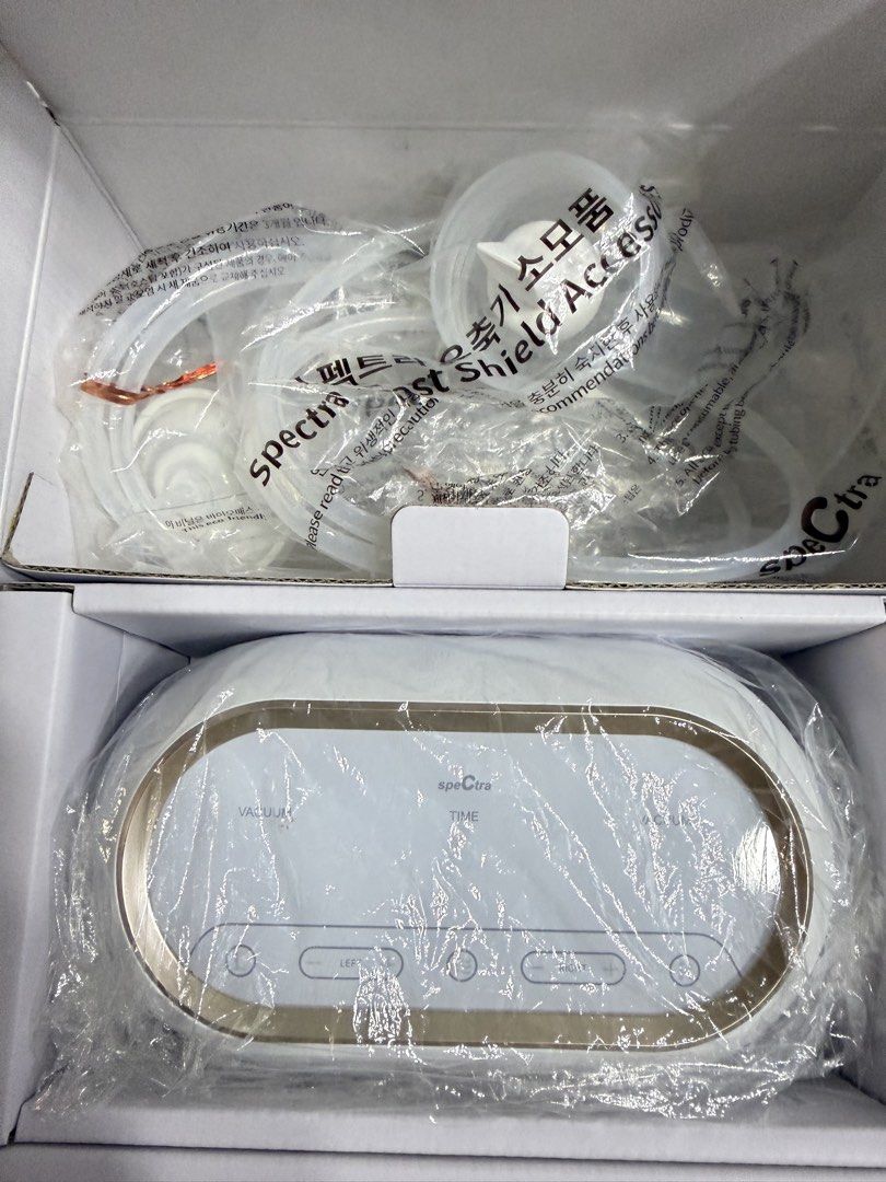 Spectra Dual Compact Electric Breast Pump (Preloved) (Category: Breastfeeding & Bottle Feeding) located in Taguig. Submitted by 4e_fam_finds (Listing ID 1466384112, Image 3). Description: - Model: Spectra Dual Compact double electric breast pump - Condition: Used Like new, used contents inside protective packaging with original box - Key Features: Dual motors, built-in rechargeable battery, back-flow protection, and built-in timer - Inclusions: P
