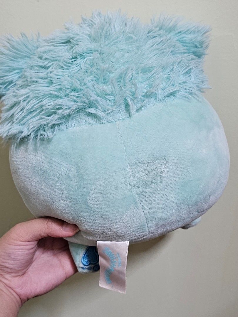 Squishmallow Bigfoot 7 inches (Joelle) (Category: Character Goods) located in Kabankalan. Submitted by ninunothrift (Listing ID 1466401588, Image 3). Description: No paper tag. Has flaw at the back (See picture). In otherwise good condition, washed, and very soft :]' MOP: Gcash MOD: J&T Loc: Negros.