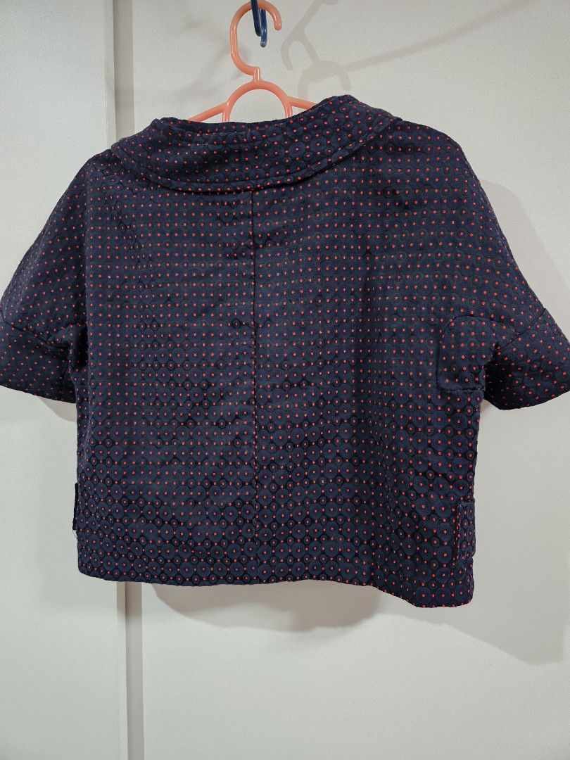 SSeni Navy Blue Red Polka Dot Jacket Blazer (Category: Coats, Jackets and Outerwear) located in Caloocan City. Submitted by rm.diaz (Listing ID 1466494937, Image 3). Description: - Color & Pattern: Navy blue with vibrant red polka dots - Design: Short sleeves, front button closure with bright red buttons, structured collar - Fabric & Interior: Textured patterned fabric, fully lined with brand label tag - Care: Dry clean only - Style: Cute casual 