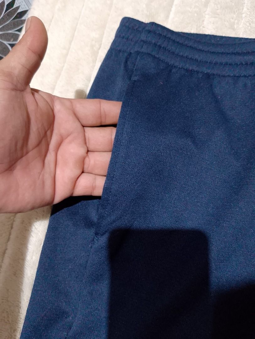 Starter navy blue athletic drawstring shorts (Category: Shorts) located in Cavite. Submitted by marvzclothing (Listing ID 1466457643, Image 2). Description: - Brand: Starter - Color: Navy Blue - Size/Fit: Elastic waistband with matching adjustable drawstring - Details: Embroidered Starter logo near the hem - Material: Lightweight and breathable fabric - Length: Approx. 18 inches - Condition: Clean, well-maintained - Best for: Gym workouts, runnin