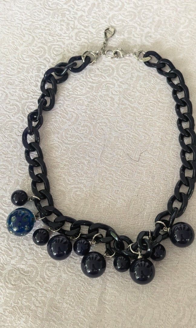 Statement necklace in blue black color (Category: Necklaces) located in Tuguegarao City. Submitted by zenphoenix-7ad615 (Listing ID 1466381130, Image 1). Description: Statement lucite necklace With brand.