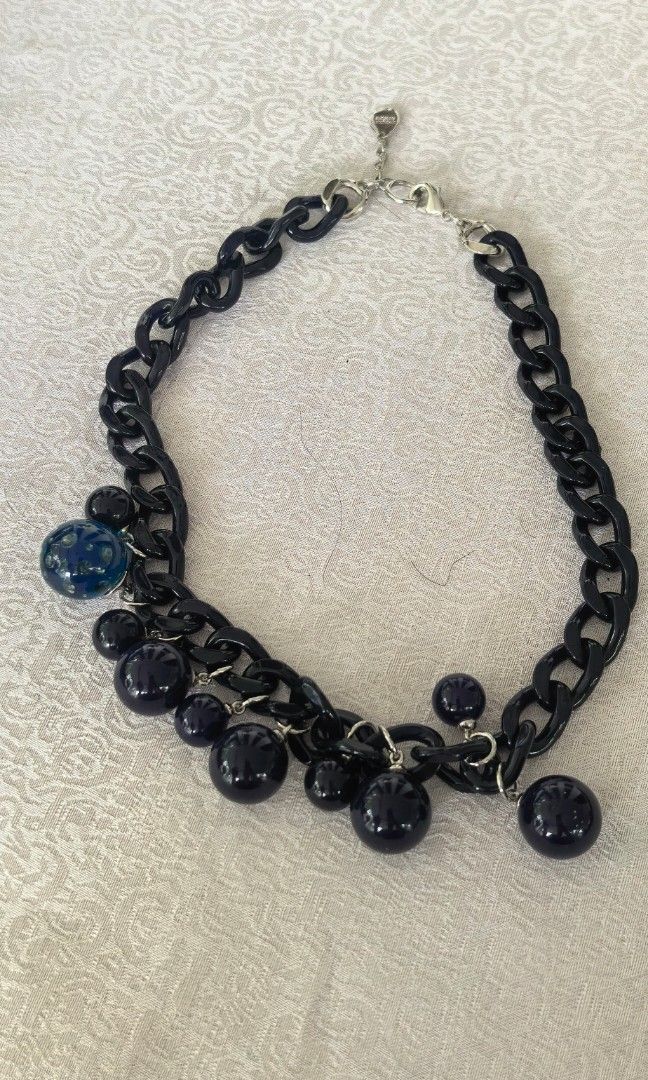Statement necklace in blue black color (Category: Necklaces) located in Tuguegarao City. Submitted by zenphoenix-7ad615 (Listing ID 1466381130, Image 3). Description: Statement lucite necklace With brand.