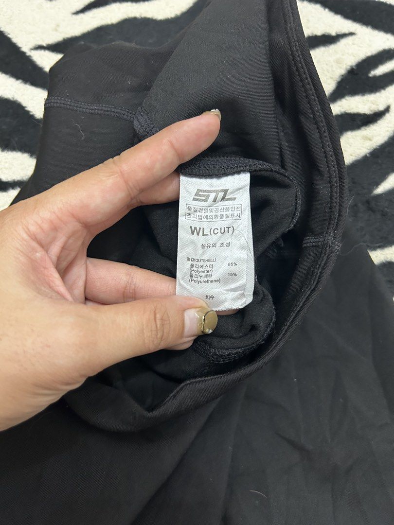 STL Black Activewear flare Pants (Category: Activewear) located in Valencia. Submitted by crizzagella20 (Listing ID 1466500557, Image 2). Description: - Brand: STL - Color: Solid black - Style: High waist with flare cut legs - Material: 85% polyester, 15% polyurethane (stretchy workout fabric) - Size/Fit: Fits waist 27 to 32 inches - Length: 37 inches - Note: Fabric label marked WL (CUT).