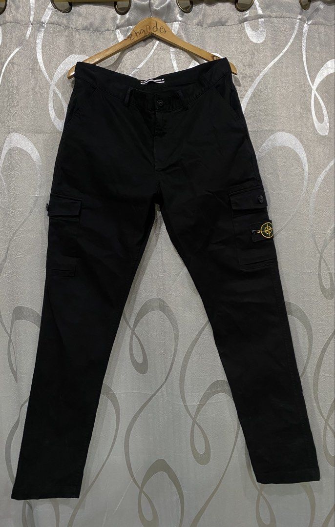 Stone Island Black cargo with logo patch (Category: Jeans) located in Digos. Submitted by zhanderapp47607 (Listing ID 1466444175, Image 1). Description: Stone Island Black cargo with logo patch Waistline 32-34 can fit Length 43 Excellent condition Colorate 9.8/10 No issue .