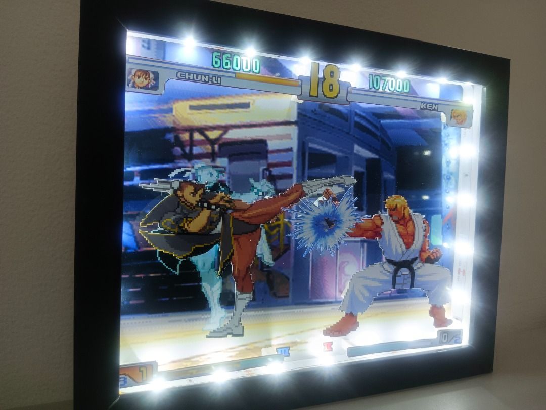 Street Fighter 3: Retro Game Shadow Box (Category: Nintendo) located in Quezon City. Submitted by natzuki10 (Listing ID 1466362019, Image 2). Description: Street Fighter 3: Retro Game Shadow Box Height: 8 inches Width: 10 inches 750 w/o lights 920 w/ lights *Handmade Pixel Shadow Boxes *Accepting Customized Designs *Perfect for Gamers & Collectors #videogames #nintendo #roomdecor #collection #gamer #gift #retrogame .