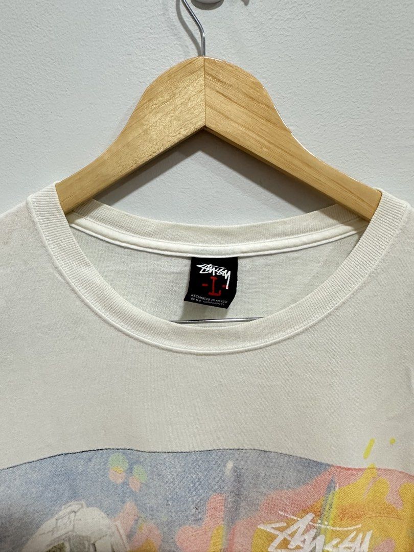 Stüssy Galactic Wars Japan Edition Tee 08S (Category: Tshirts & Polo Shirts ) located in Manila. Submitted by ylsrarities (Listing ID 1466482097, Image 3). Description: Details: • Stüssy • Galactic Wars graphic • Japan Edition • 08S • Size L • White / off white • 100% cotton • Made in Mexico • Assembled in Mexico of U.S. components • Original Stüssy tags Condition: 9/10 pre-owned condition with natural signs of wear and a small mark/stain on the 