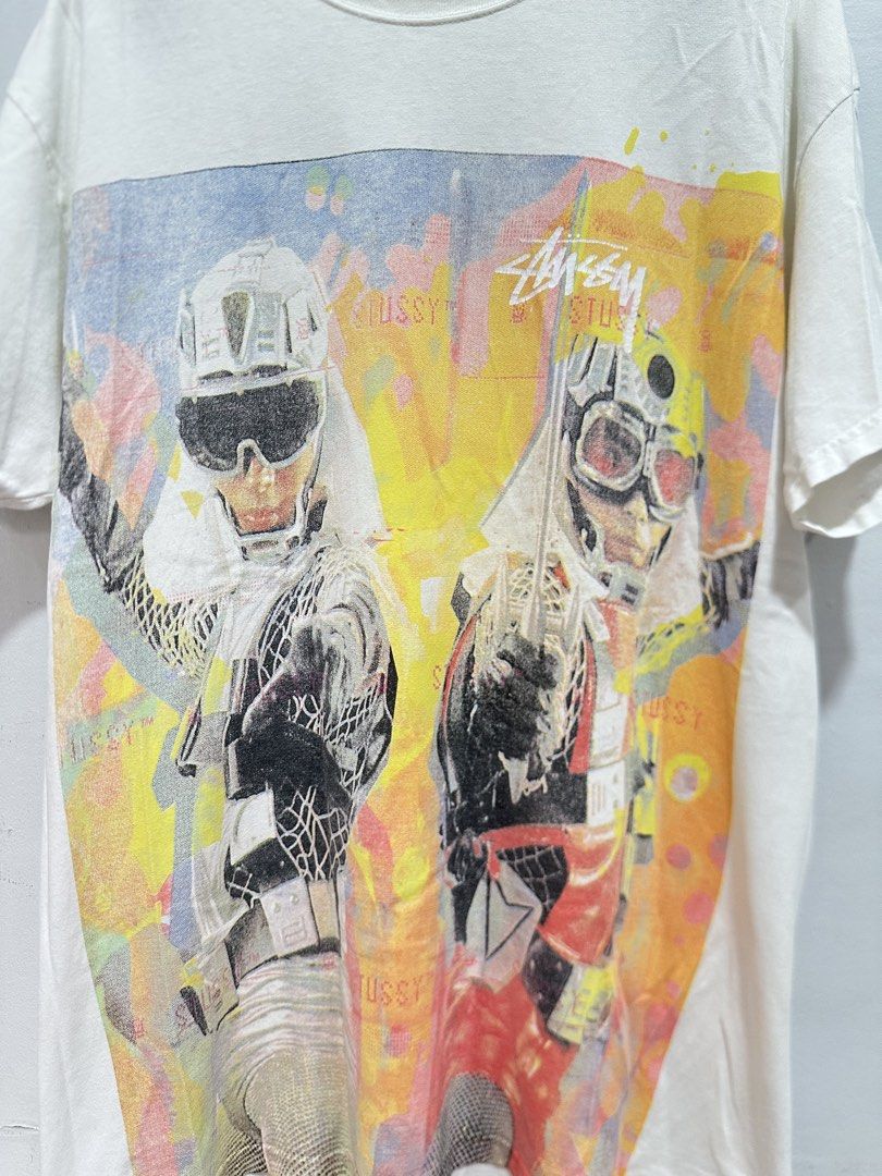 Stüssy Galactic Wars Japan Edition Tee 08S (Category: Tshirts & Polo Shirts ) located in Manila. Submitted by ylsrarities (Listing ID 1466482097, Image 2). Description: Details: • Stüssy • Galactic Wars graphic • Japan Edition • 08S • Size L • White / off white • 100% cotton • Made in Mexico • Assembled in Mexico of U.S. components • Original Stüssy tags Condition: 9/10 pre-owned condition with natural signs of wear and a small mark/stain on the 