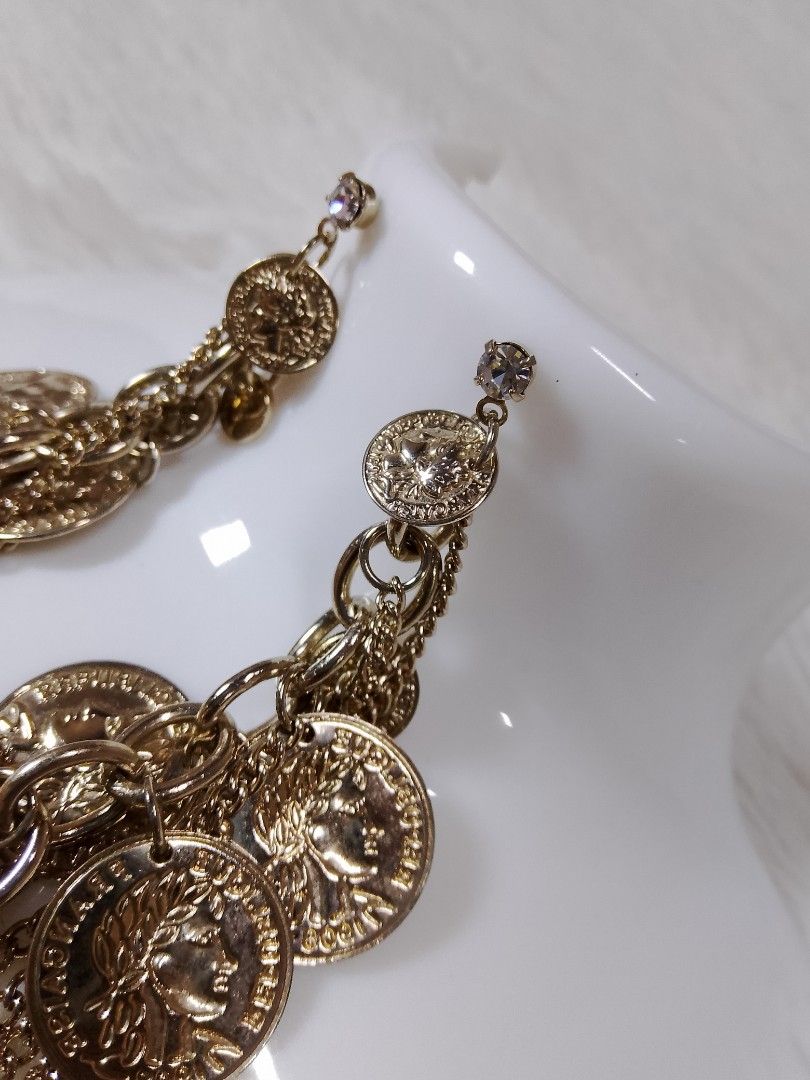 Stud earrings Coin design (Category: Earrings) located in Manila. Submitted by jym008 (Listing ID 1466538587, Image 3). Description: Stud earrings with coin design goldtone color 750+sf location manila.