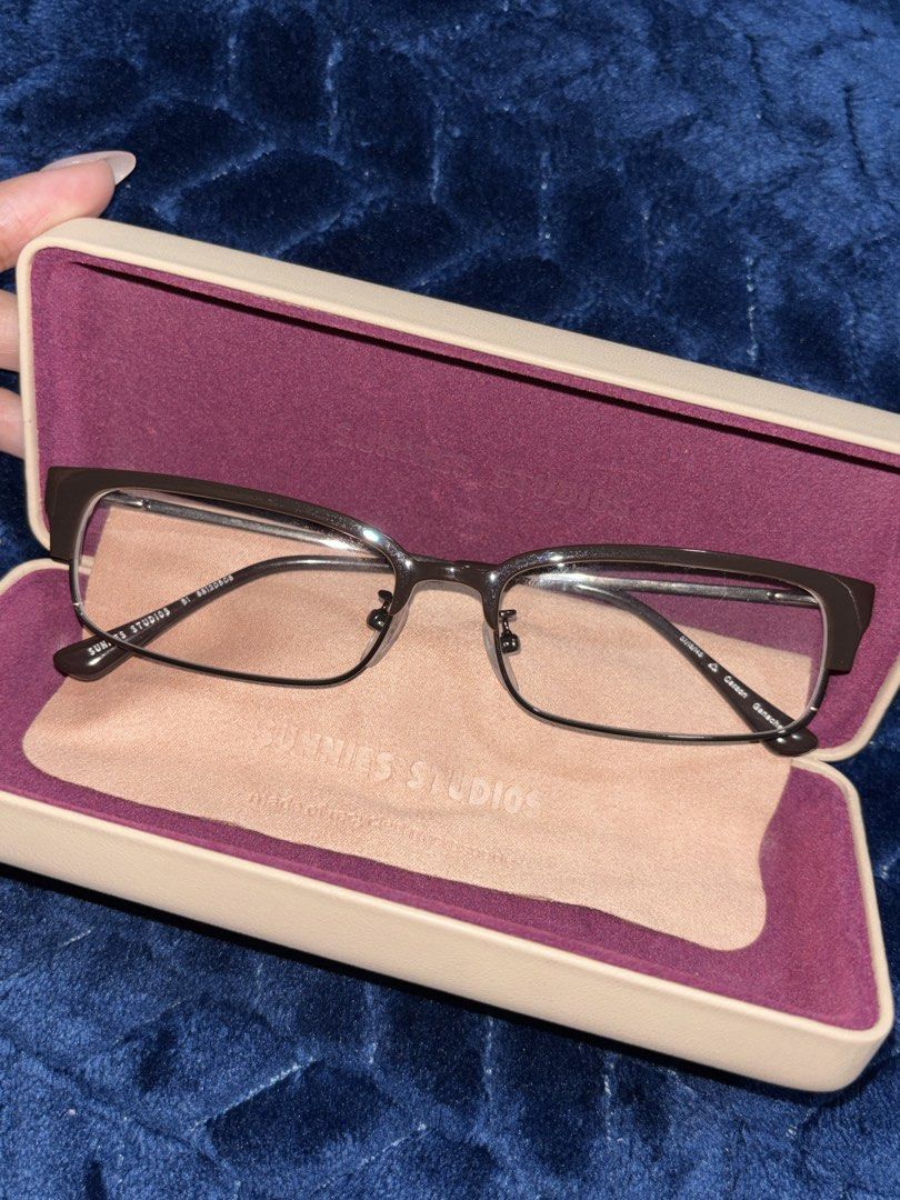 Sunnies Studios Carson Ganache Eyeglasses (Category: Sunglasses & Eyewear) located in Manila. Submitted by rachelmsabila22 (Listing ID 1466477376, Image 3). Description: - Brand/Model: Sunnies Studios Carson - Colorway: Ganache (Sleek dark brown finish) - Frame Shape: Rectangular - Inclusions: Original hard case and microfiber cleaning cloth - Condition: Well-maintained, stored properly when not worn - Usage: Great everyday optical pair.