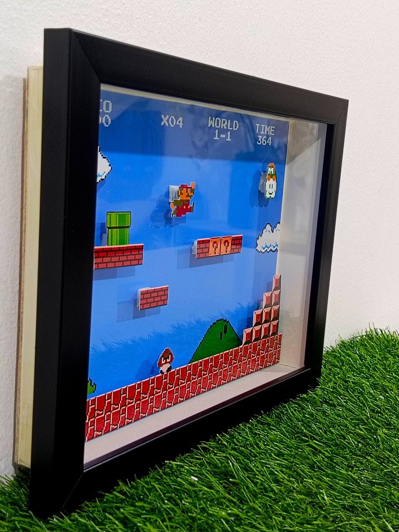 Super Mario 1985 Retro Video Game Shadow Box (Category: Nintendo) located in Quezon City. Submitted by natzuki10 (Listing ID 1466371382, Image 3). Description: Super Mario 1985 Retro Video Game Shadow Box Height: 8 inches Width: 10 inches 750 w/o lights 920 w/ lights *Handmade Pixel Shadow Boxes *Accepting Customized Designs *Perfect for Gamers & Collectors #videogames #roomdecor #collection #gamer #gift .