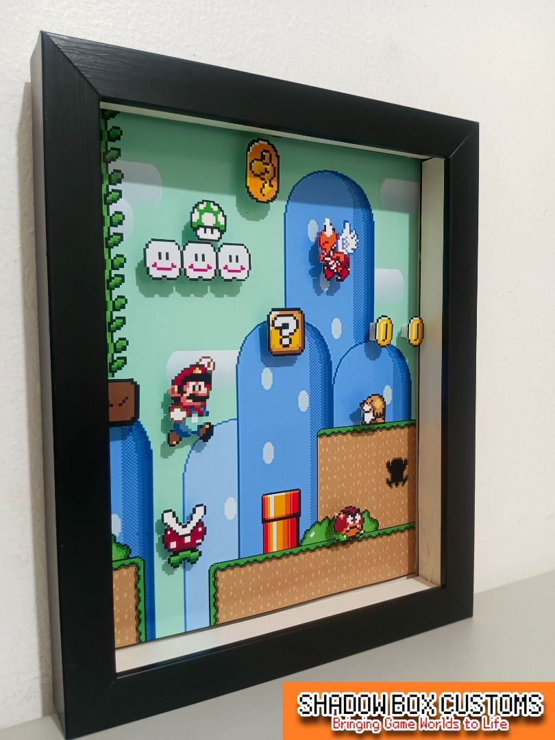 Super Mario World 3 Video Game Shadow Box (Category: Nintendo) located in Quezon City. Submitted by natzuki10 (Listing ID 1466359207, Image 3). Description: Super Mario World 3 Video Game Shadow Box Height: 10 inches Width: 8 inches 750 w/o lights 920 w/ lights *Handmade Pixel Shadow Boxes *Accepting Customized Designs *Perfect for Gamers & Collectors #videogames #roomdecor #collection #gamer #gift #supermario .