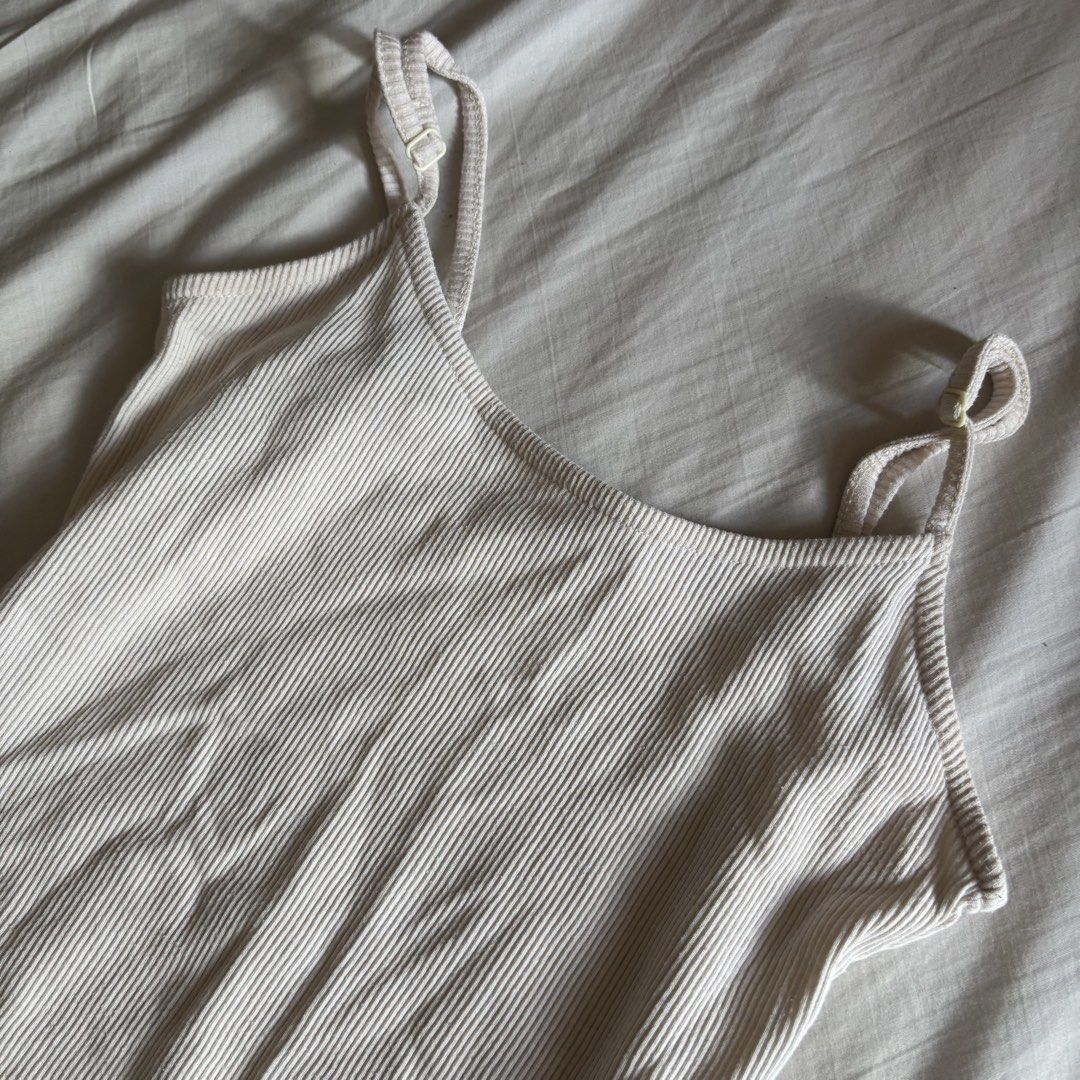 Supre Cream Ribbed Bodysuit Top (Category: Sleeveless) located in Binan City. Submitted by myprelovedhaul (Listing ID 1466397547, Image 2). Description: - fits xs to small! - no when worn photos! - last price posted! - please message only if sure buyer! - limited replies only. - Available unless mark as sold. - Ship via j&t or lalamove for same day. -Mode of payment: Gcash 📍Biñan Laguna .