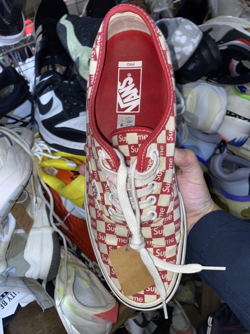 Supreme x Vans Checkerboard Authentic Pro Red (Category: Sneakers) located in Baguio. Submitted by workwear2600 (Listing ID 1466550398, Image 2). Description: - Brand: Supreme x Vans - Color/Pattern: Red and white checkerboard with Supreme branding - Size: Men's US 10 / UK 9 / EU 43 / CM 28 - Features: Red interior lining and blue UltraCush insoles for extra comfort - Details: Made in China, includes woven Vans side tag and Pro footbed tag - Cond