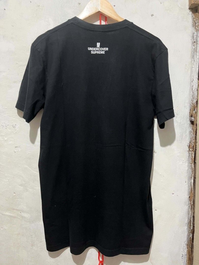 SUPREMExUNDERCOVER (Category: Formal Shirts) located in Leyte. Submitted by thriftflip2 (Listing ID 1466354101, Image 3). Description: SUPREMExUNDERCOVER T SHIRT NO ISSUE NO CRACK PRINT SIZE XL ON TAG WIDTH 21.5 LENGTH 30 OFF/LEGIT.