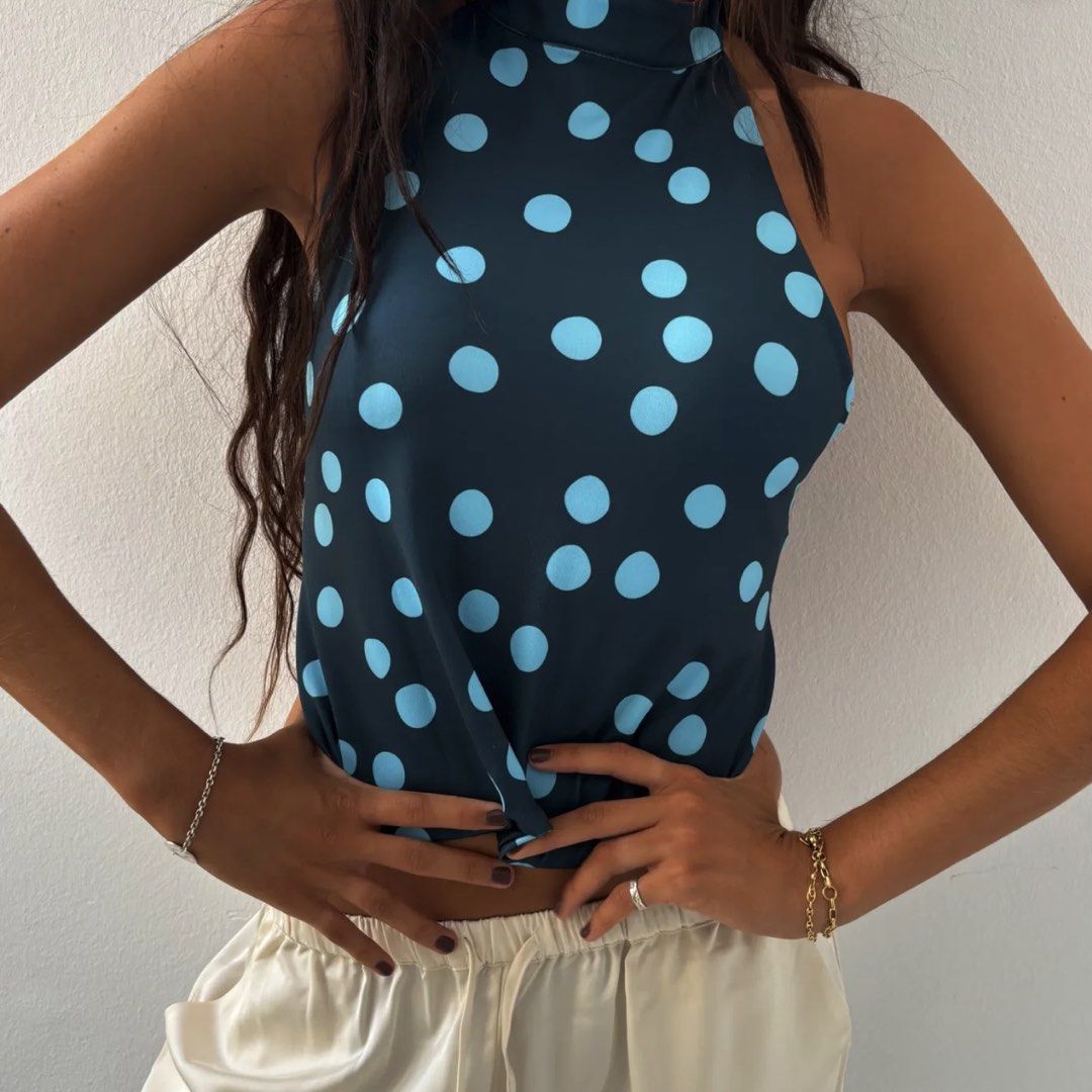 Susmie's Dalia Reversible Top (Category: Sleeveless) located in Cainta. Submitted by taygracie (Listing ID 1466540094, Image 2). Description: Used only once. No issues. Authentic – bought for 3,800 PHP from Moai Concept Store in Makati. One size. Free shipping via J&T..