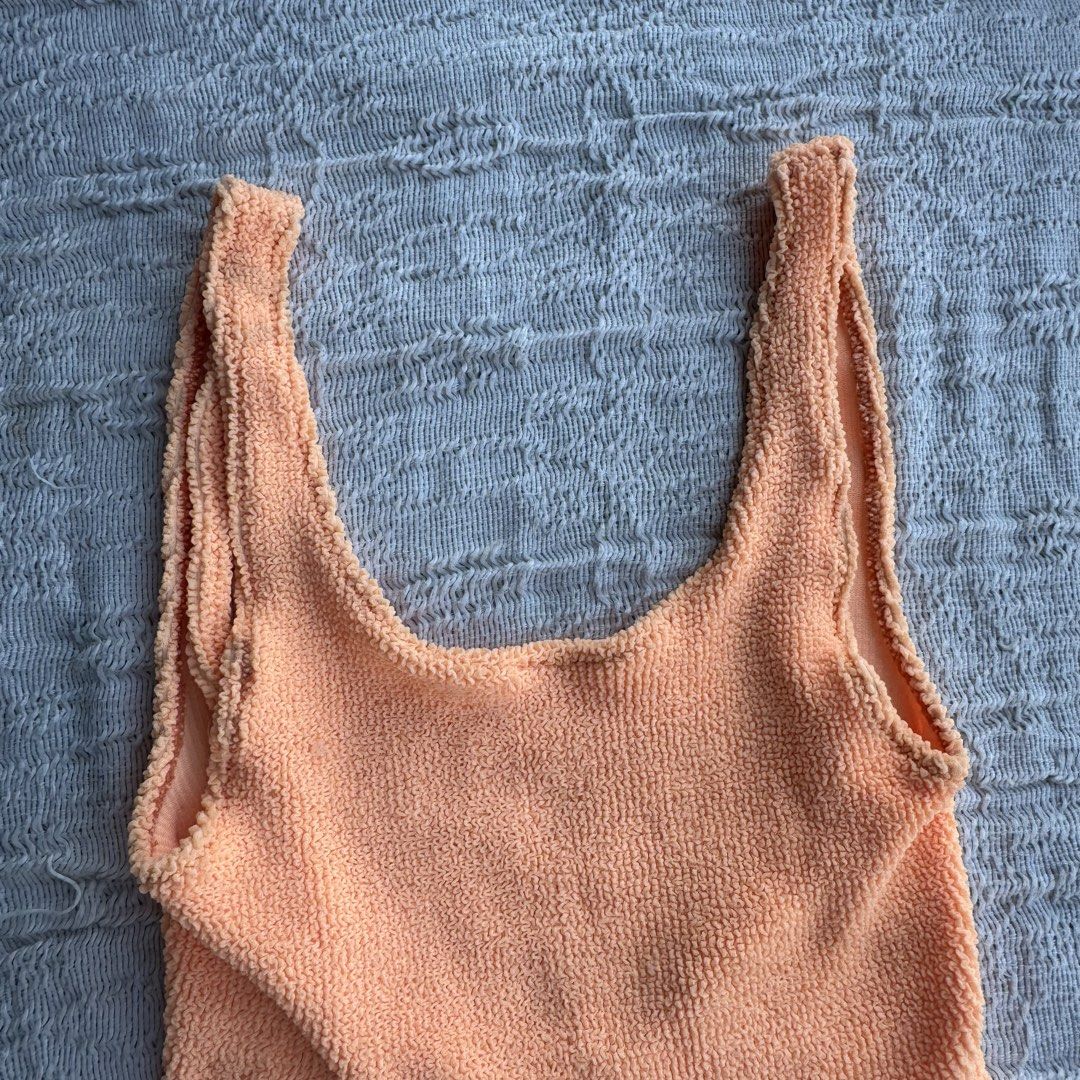 Swimsuit Light Orange Textured One Piece (Category: Bikinis & Swimsuits) located in Manila. Submitted by thriftclub.ph (Listing ID 1466498328, Image 2). Description: ▫️Decluttering (too many swimwear!) ◻️ Fits xs - s ⬜️ No pad slots ⚪️ Bought but never used .