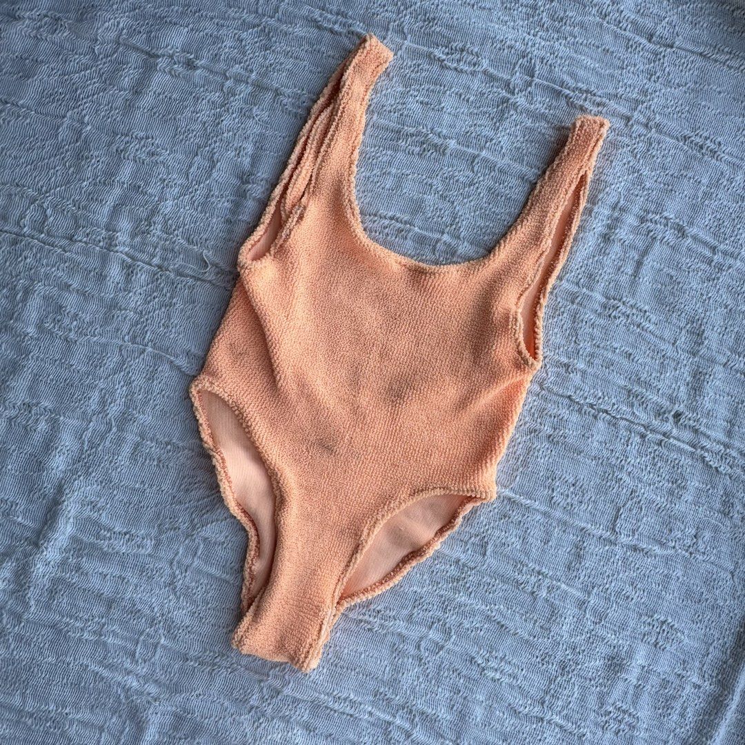 Swimsuit Light Orange Textured One Piece (Category: Bikinis & Swimsuits) located in Manila. Submitted by thriftclub.ph (Listing ID 1466498328, Image 1). Description: ▫️Decluttering (too many swimwear!) ◻️ Fits xs - s ⬜️ No pad slots ⚪️ Bought but never used .