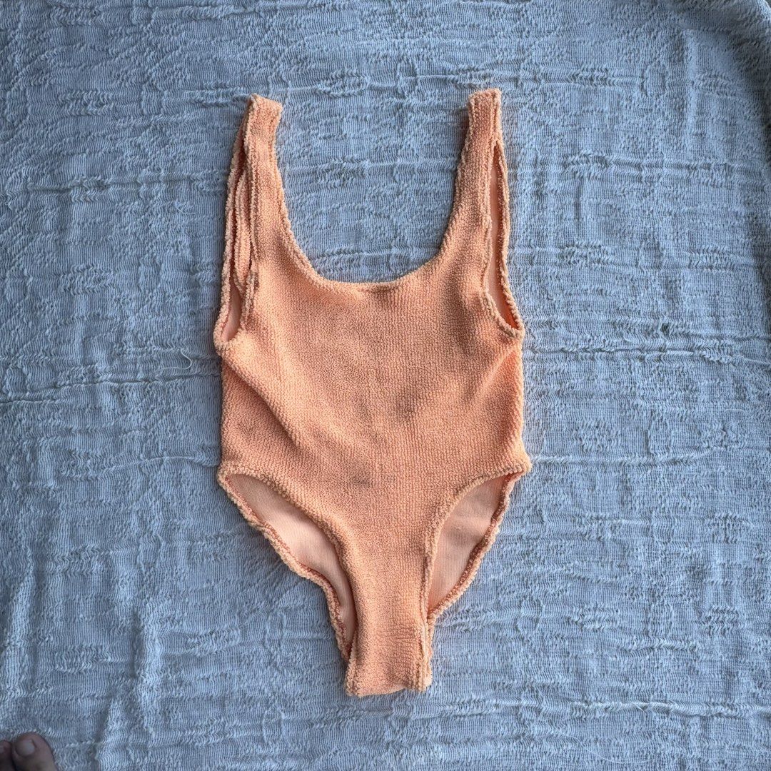 Swimsuit Light Orange Textured One Piece (Category: Bikinis & Swimsuits) located in Manila. Submitted by thriftclub.ph (Listing ID 1466498328, Image 3). Description: ▫️Decluttering (too many swimwear!) ◻️ Fits xs - s ⬜️ No pad slots ⚪️ Bought but never used .