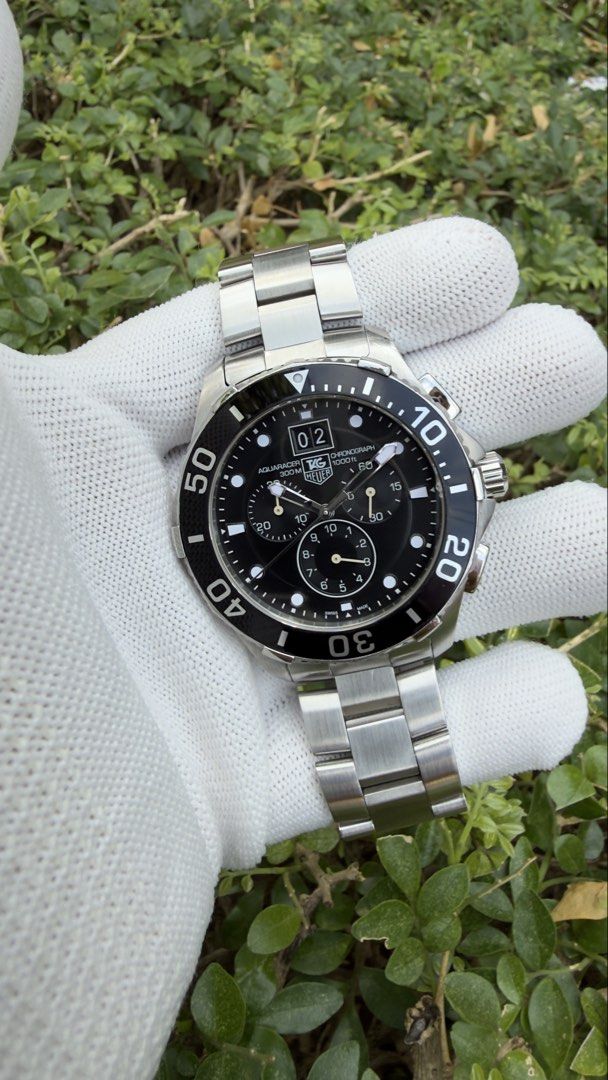 TAG Heuer Aquaracer CAN1010 (Category: Men's Watches) located in Imus. Submitted by WellWatchesss (Listing ID 1466345926, Image 1). Description: TAG Heuer Aquaracer CAN1010 43mm Quartz Chronograph Year 2011 Supplied With Box, Card, Manual Booklet and Links.
