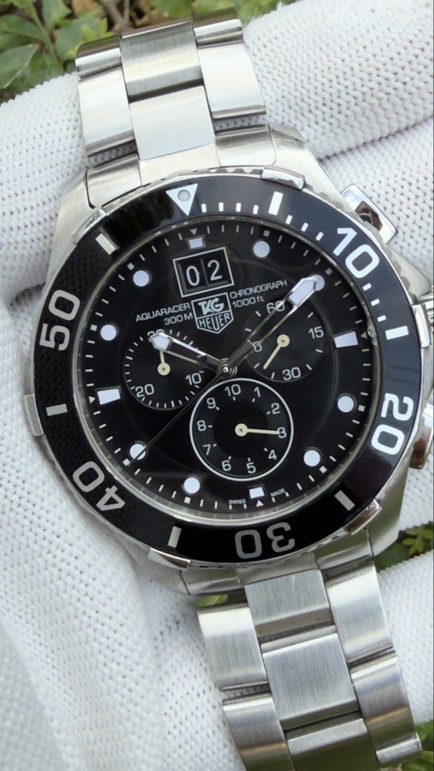 TAG Heuer Aquaracer CAN1010 (Category: Men's Watches) located in Imus. Submitted by WellWatchesss (Listing ID 1466345926, Image 2). Description: TAG Heuer Aquaracer CAN1010 43mm Quartz Chronograph Year 2011 Supplied With Box, Card, Manual Booklet and Links.