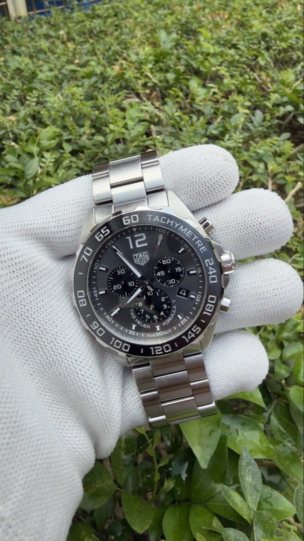 TAG Heuer Formula 1 CAZ1011 (Category: Men's Watches) located in Imus. Submitted by WellWatchesss (Listing ID 1466345686, Image 1). Description: TAG Heuer Formula 1 CAZ1011 43mm Quartz Chronograph Grey Dial Fixed Ceramic Tachymetre Bezel Year 2021.