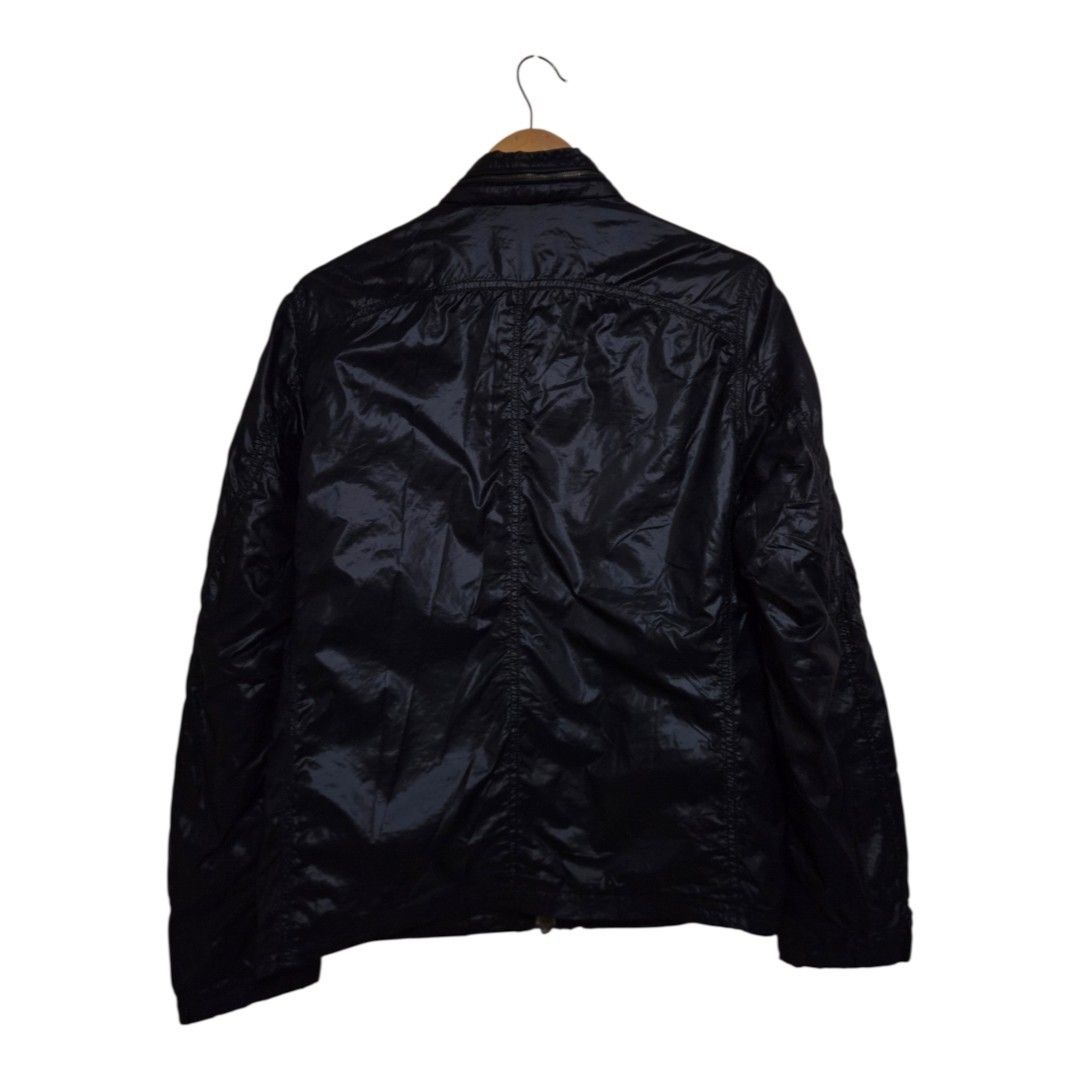 Takeo kikuchi nylon biker jacket (Category: Coats, Jackets and Outerwear) located in Baguio. Submitted by fadexquisite (Listing ID 1466452002, Image 2). Description: Takeo kikuchi nylon biker jacket Size3 on tag fits med 26x21 Excellent condition 700 plus ship fee.