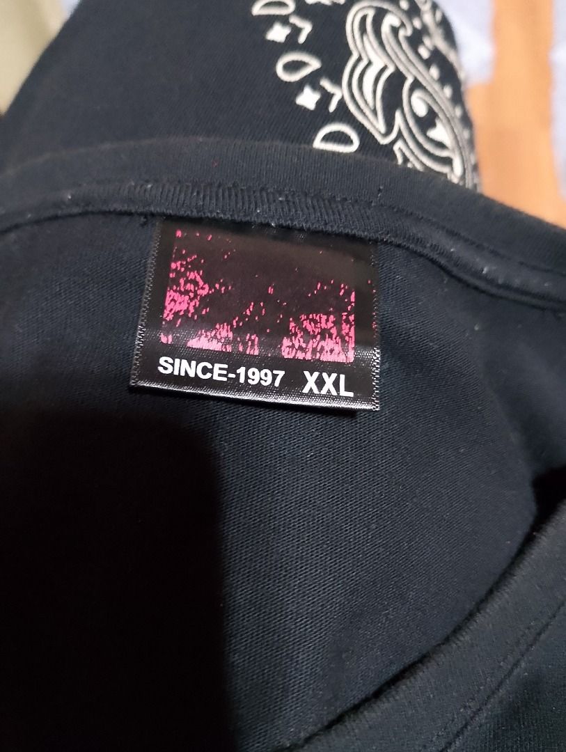 Tedman Black T-Shirt Size M (Category: Tshirts & Polo Shirts ) located in Cavite. Submitted by marvzclothing (Listing ID 1466464576, Image 3). Description: - Brand: Tedman - Size: M - Material: 100% Cotton - Design: Black short sleeve tee with white leaf graphic around neckline and Japan design concept - Details: Red Tedman logo tags on sleeve and hem - Condition: Clean, graphics intact - Style: Comfortable streetwear piece.