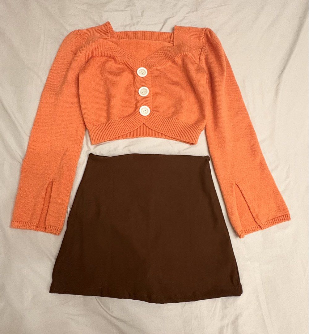 Terno knit cropped top and skort (Category: Coats, Jackets and Outerwear) located in Quezon City. Submitted by myfabpreloved (Listing ID 1466473310, Image 1). Description: Knit top cropped S-M With minor flaw see last pic (super liit na stain barely noticeable) Skirt (front andback) with inner shorts still new Best fit upto 28” but can stretched upto 30” wl .