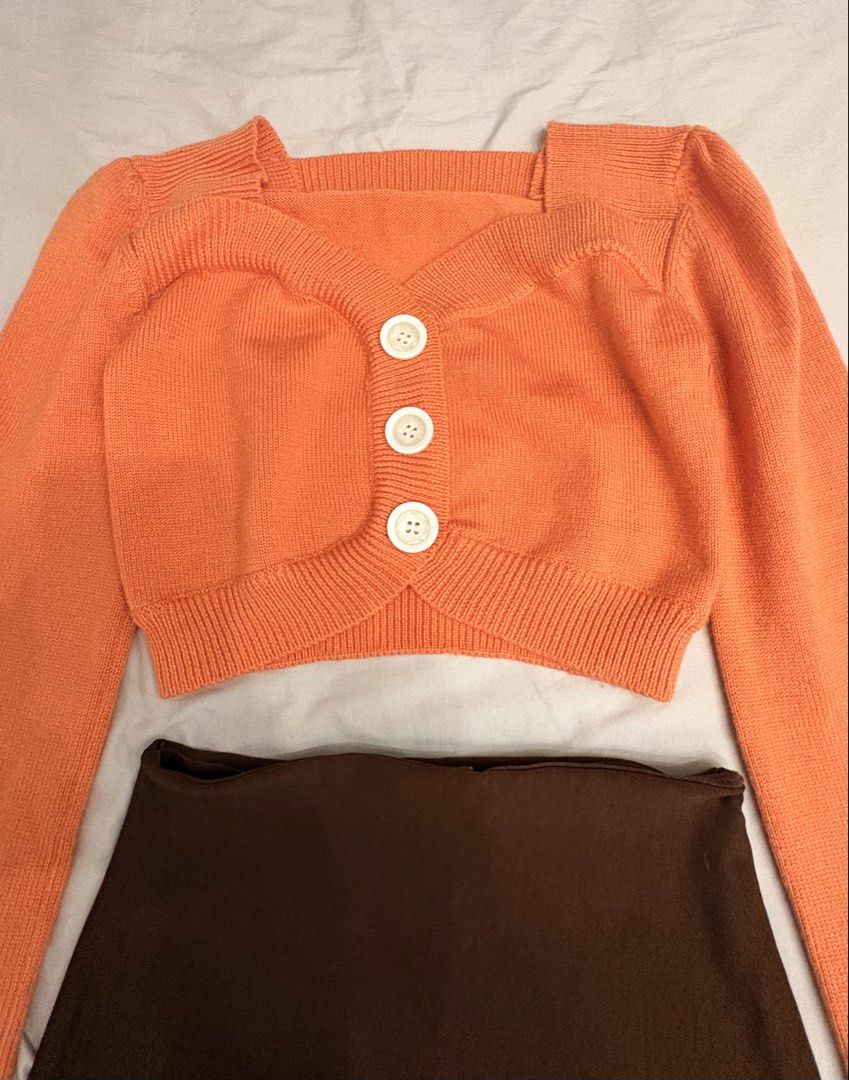 Terno knit cropped top and skort (Category: Coats, Jackets and Outerwear) located in Quezon City. Submitted by myfabpreloved (Listing ID 1466473310, Image 3). Description: Knit top cropped S-M With minor flaw see last pic (super liit na stain barely noticeable) Skirt (front andback) with inner shorts still new Best fit upto 28” but can stretched upto 30” wl .