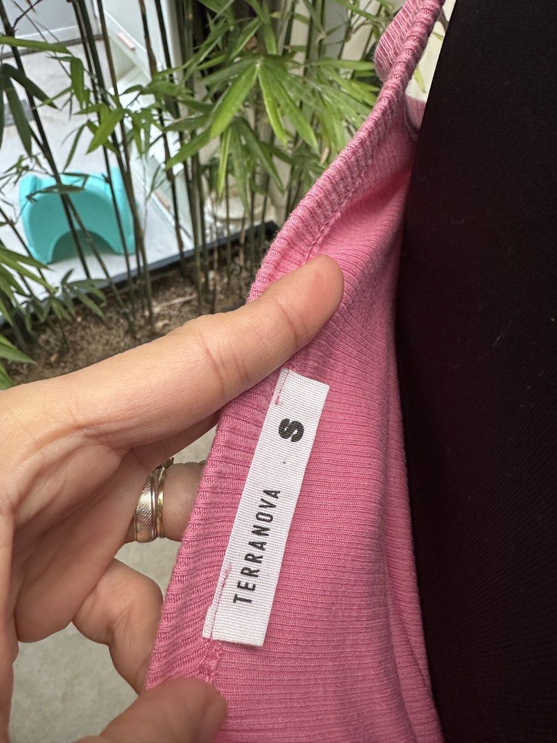 Terranova Pink Ribbed Tank Top (Category: Sleeveless) located in Bulacan. Submitted by thriftbagcollections (Listing ID 1466357517, Image 2). Description: - Brand: Terranova - Item: Ribbed tank top - Color: Bright pink - Size: Small - Fit: Stretchy - Details: Scoop neckline, thick straps - Condition: Clean, well-kept wardrobe staple.