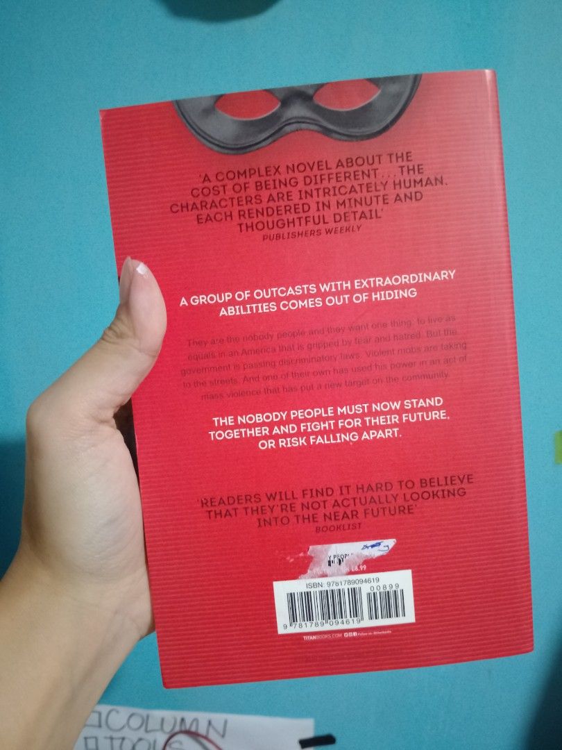The Nobody People by Bob Proehl (Category: Storybooks) located in Marikina City. Submitted by preloved.byleslie (Listing ID 1466375921, Image 3). Description: - Title & Author: The Nobody People by Bob Proehl - Genre: Superhero / Outcasts sci-fi story - Publisher: Titan Books - ISBN: 9781789094619 - Format: Paperback - Condition: Minor shelf wear on edges and pages; price sticker residue on the back cover 📍Marikina City 📚GoTyme/Gcash 📚J&T/Lala