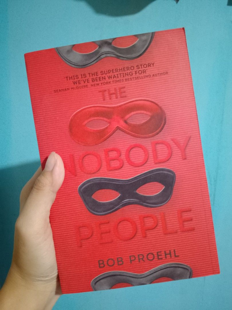 The Nobody People by Bob Proehl (Category: Storybooks) located in Marikina City. Submitted by preloved.byleslie (Listing ID 1466375921, Image 1). Description: - Title & Author: The Nobody People by Bob Proehl - Genre: Superhero / Outcasts sci-fi story - Publisher: Titan Books - ISBN: 9781789094619 - Format: Paperback - Condition: Minor shelf wear on edges and pages; price sticker residue on the back cover 📍Marikina City 📚GoTyme/Gcash 📚J&T/Lala