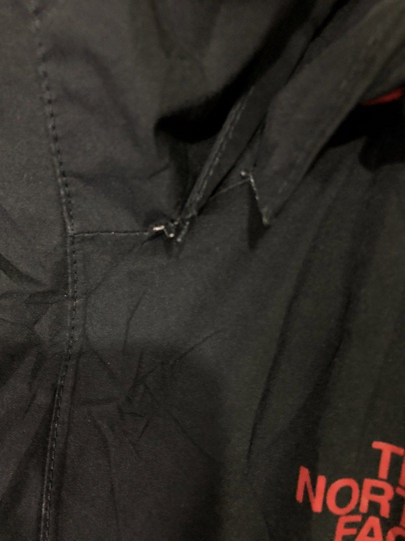 The North Face Black Hooded Jacket (Category: Coats, Jackets and Outerwear) located in Quezon City. Submitted by clarizedeo09960 (Listing ID 1466501318, Image 3). Description: - Brand: The North Face - Color: Black with red logo accents - Size: US Small / Asia Medium - Features: Attached hood, zipper closure, front pockets, adjustable drawstring hem - Origin: Made in China Issue check photos.