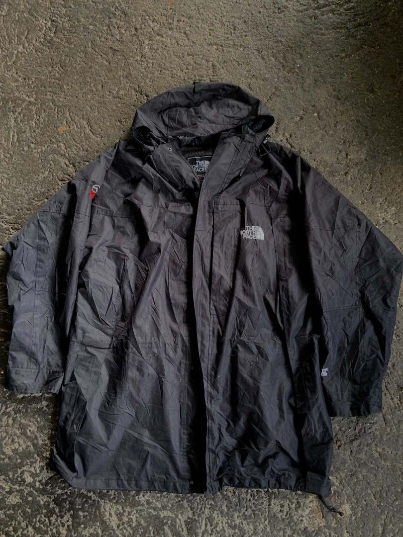 The North Face Summit Series Black Waterproof Jacket (Category: Coats, Jackets and Outerwear) located in San Jose. Submitted by thriftsja (Listing ID 1466379519, Image 1). Description: - Authentic The North Face Summit Series waterproof jacket - Color: Black with embroidered logos on chest and shoulder - Features: Built-in hood, zip-up closure, and textured fabric - Comfort: Lightweight outer layer with interior mesh lining for breathability - Id