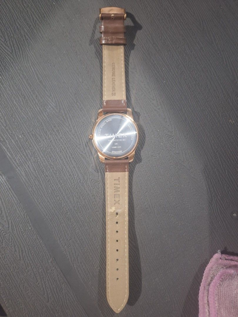 Timex Quartz Watch with Blue Dial and Brown Leather Strap (Category: Men's Watches) located in Mandaluyong City. Submitted by khute08 (Listing ID 1466448332, Image 3). Description: preloved: used 2 - 3x only. - Brand: Timex - Movement: Quartz - Dial: Striking blue with day and date sub-dials - Case: Gold-tone - Strap: Brown leather with buckle closure (minor wear on inner lining near adjustment holes) - Inclusion: Original black Timex box with re